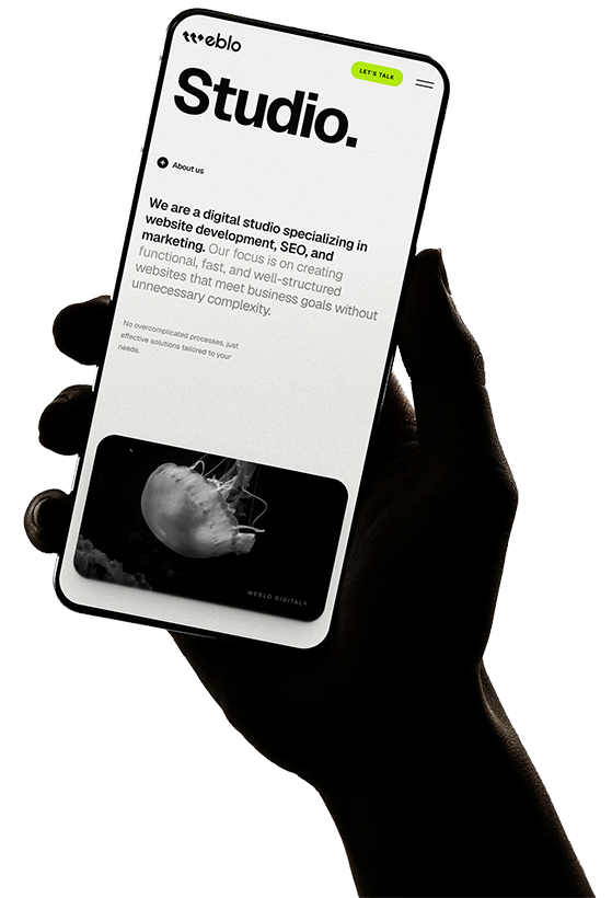 Hand holding phone demonstrating our website